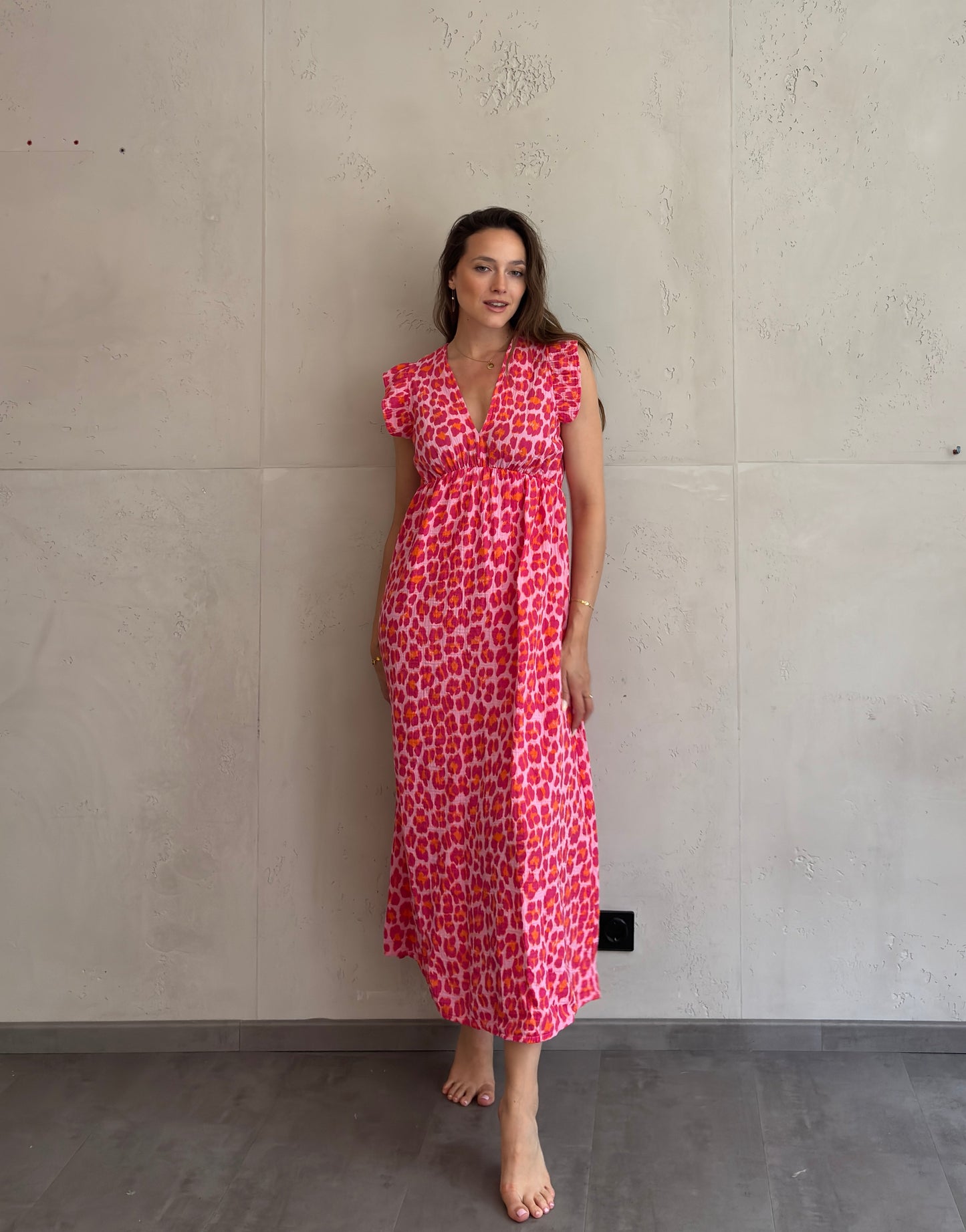 Mari Carmen | Vestido largo de leopardo con escote en la espalda