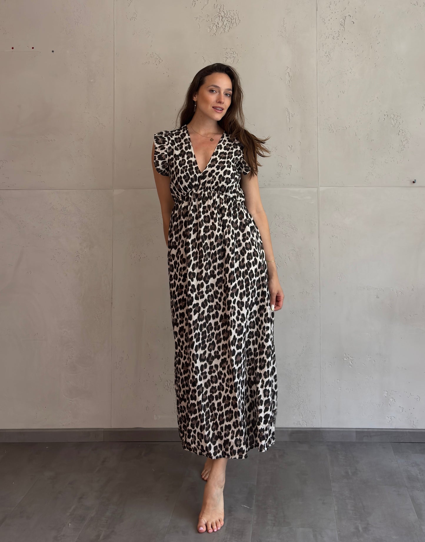 Mari Carmen | Vestido largo de leopardo con escote en la espalda