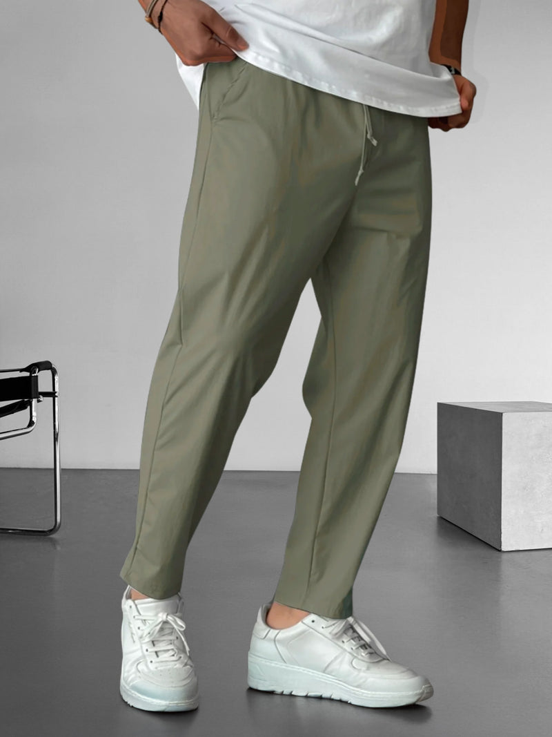 Elegantes pantalones ajustados con cordón