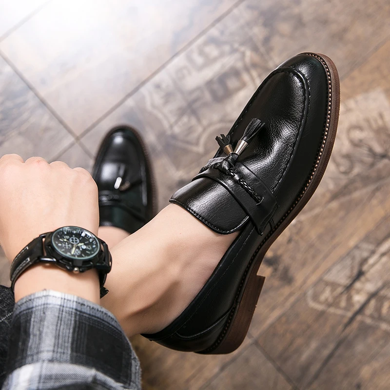 Mocasines de piel con borlas